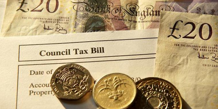 Council tax bill with money